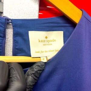 Kate Spade New York's signature navy blue cocktail dress